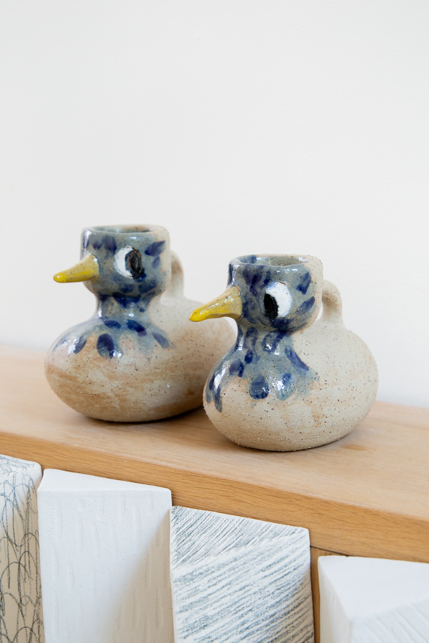 2 bird vases